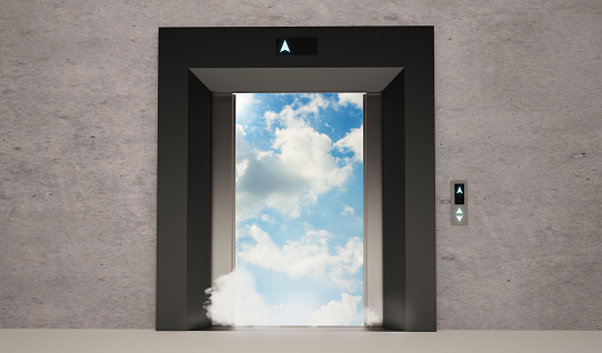 Elevator doors open with blue sky