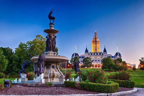 The Connecticut State Capitol building with the Corning Fountain in the foreground.  The fountain was dedicated in 1899.