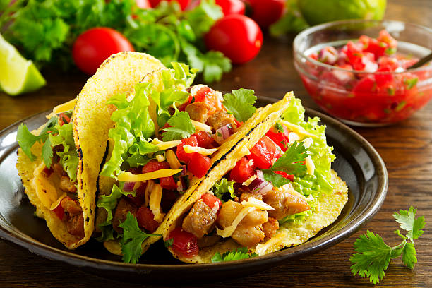 istock Tacos with pork and tomato salsa. 491322329