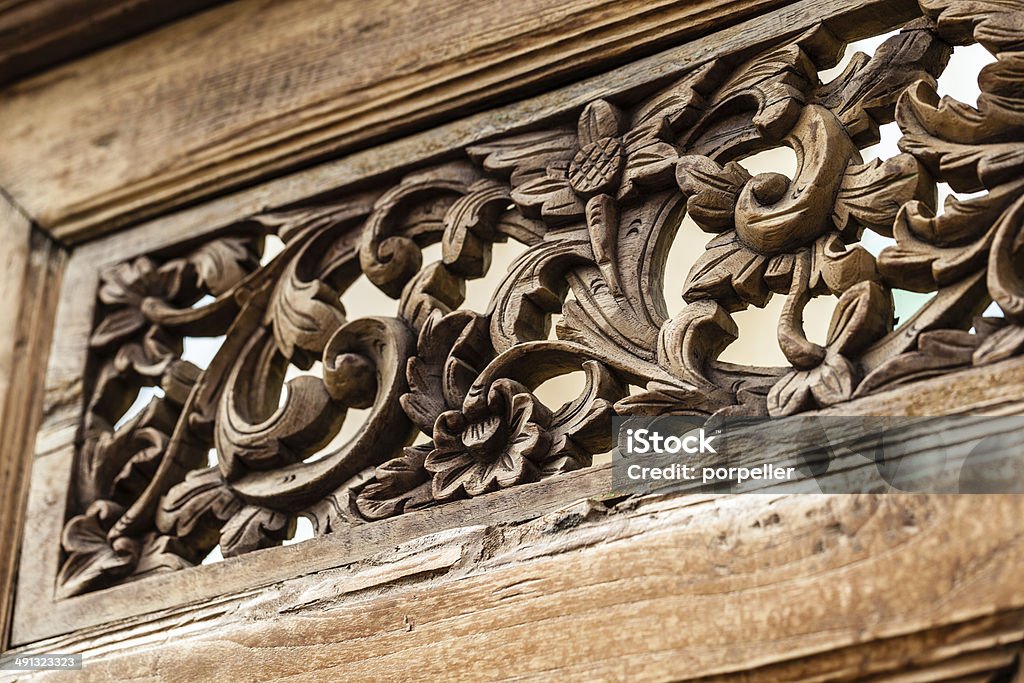 Floral carvings close up shot of some intricate floral patterns carvings on a wood panel Antique Stock Photo