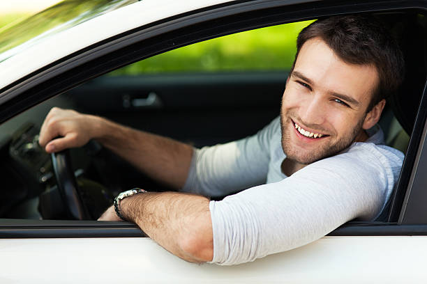 istock Young man sitting in a car 491323503
