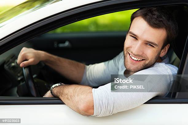 Young Man Sitting In A Car Stock Photo - Download Image Now - Adult, Adults Only, Car