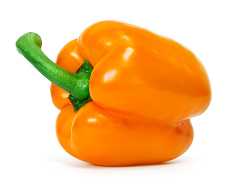 Orange bell pepper over white background