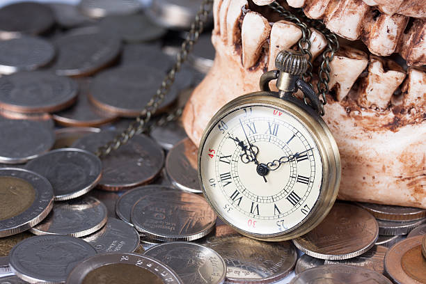 istock Pocket wach and human skull 491324873