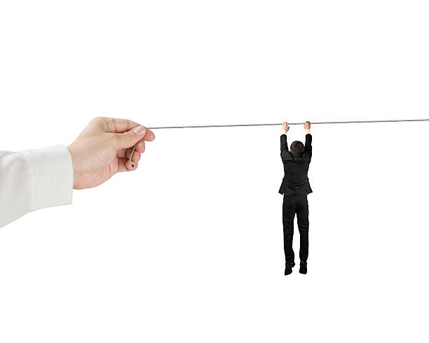 istock Holding and hanging on rope 491326419