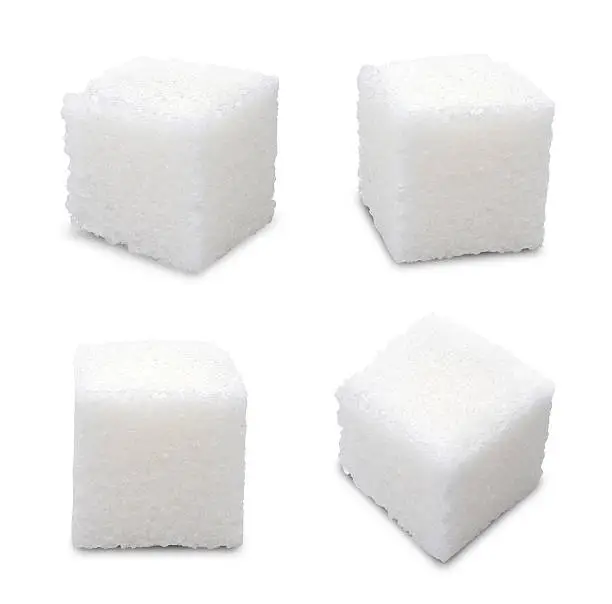 Set of sugar cubes on white background
