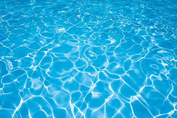 istock Bright and clear water surface in swimming pool 491331742