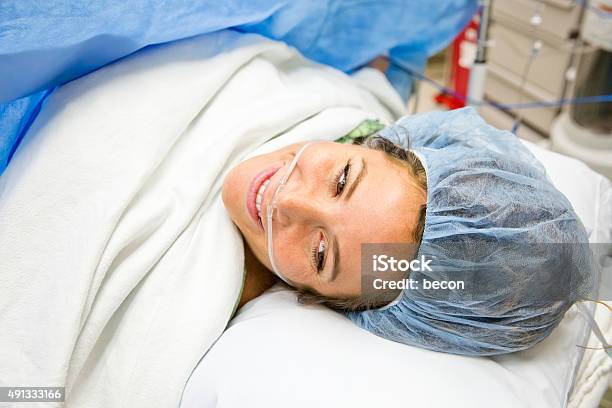 Cesarean Section Csection Birth Mother And Newborn Stock Photo - Download Image Now