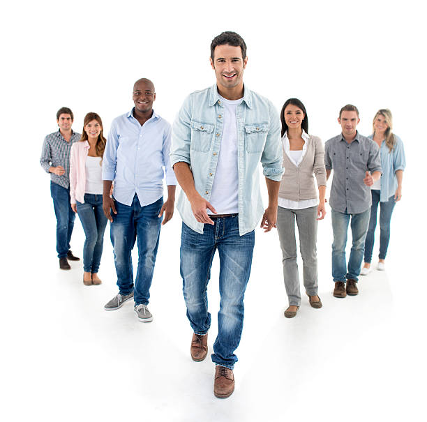 istock Casual man walking and leading a group 491335486