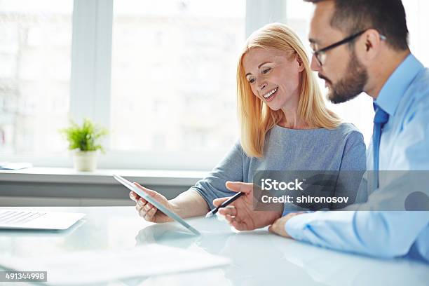 Looking At Data Stock Photo - Download Image Now - 2015, Adult, Asking