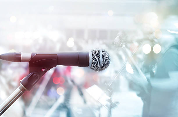 istock Abstract microphone with guitarist on stage, pastel color 491345516