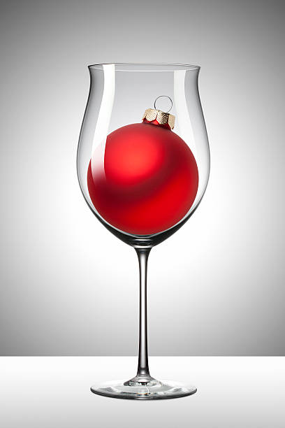Wine glass with Christmas ball. Photo with clipping path.