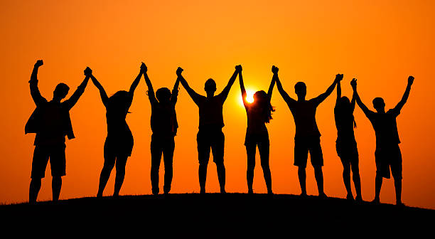istock Group Of People Celebration Cheerful Sunset Concept 491350620
