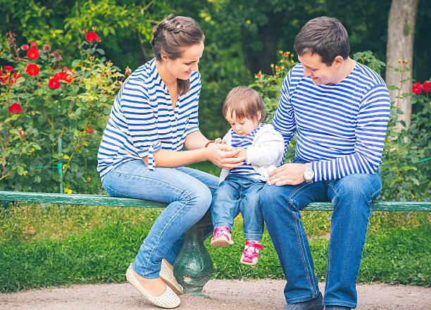 istock family with child nature happy peoples outdoors in stripe clothes 491350708