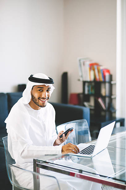 istock Emirati Man Working at Home 491352384