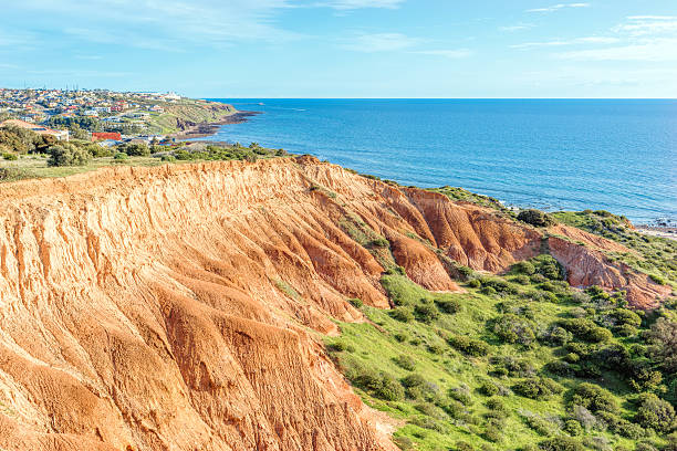 istock Rock and a small residental area in distant 491359482