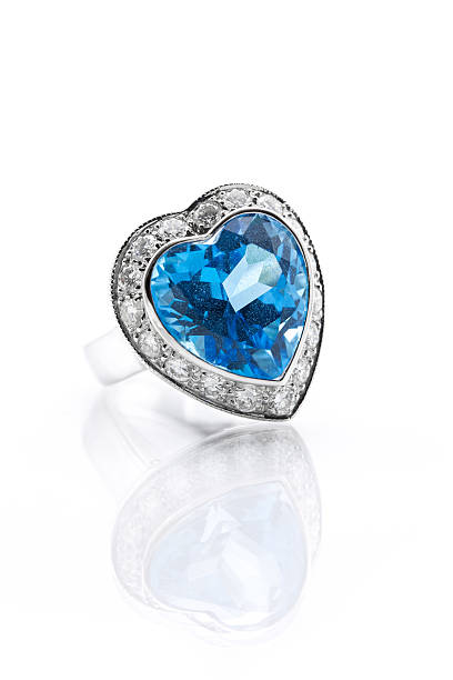 Blue topaz surrounded with diamond ring stock photo