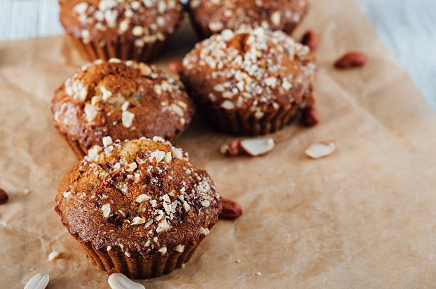 istock Homemade banana peanut muffins on baking paper 491362604