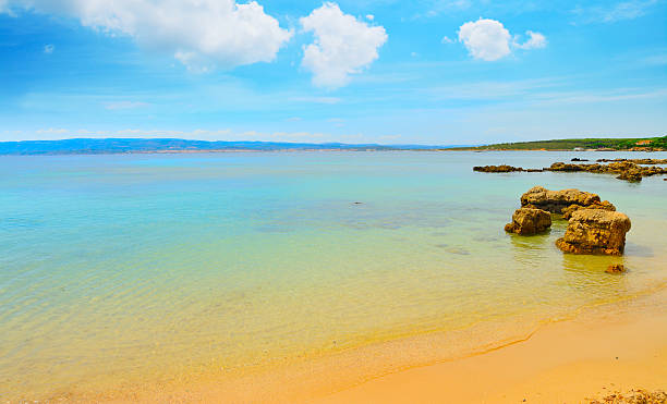 istock golden sand in Alghero shoreline 491363678