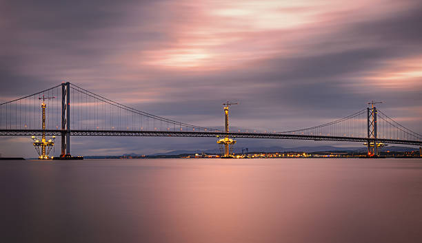 istock Forth Road Bridge and Queensferry Crossing under construction in Edinburgh 491363930
