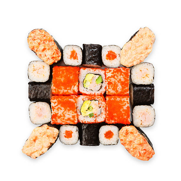 Set of sushi, maki, gunkan and rolls isolated at white