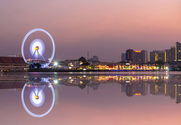 istock Ferris wheel river side at twilight time on Bangkok cityscape 491374475