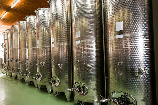 istock Stainless steel tanks for winemaking inside of a winery. 491375034