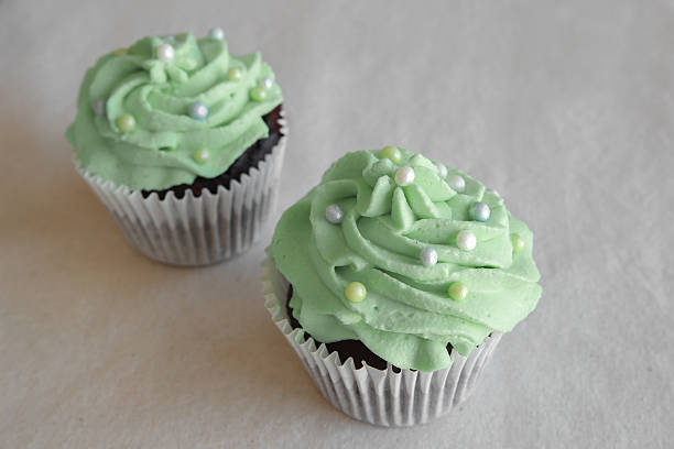 istock Homemade chocolate cupcake with Christmas tree frosting 491376542