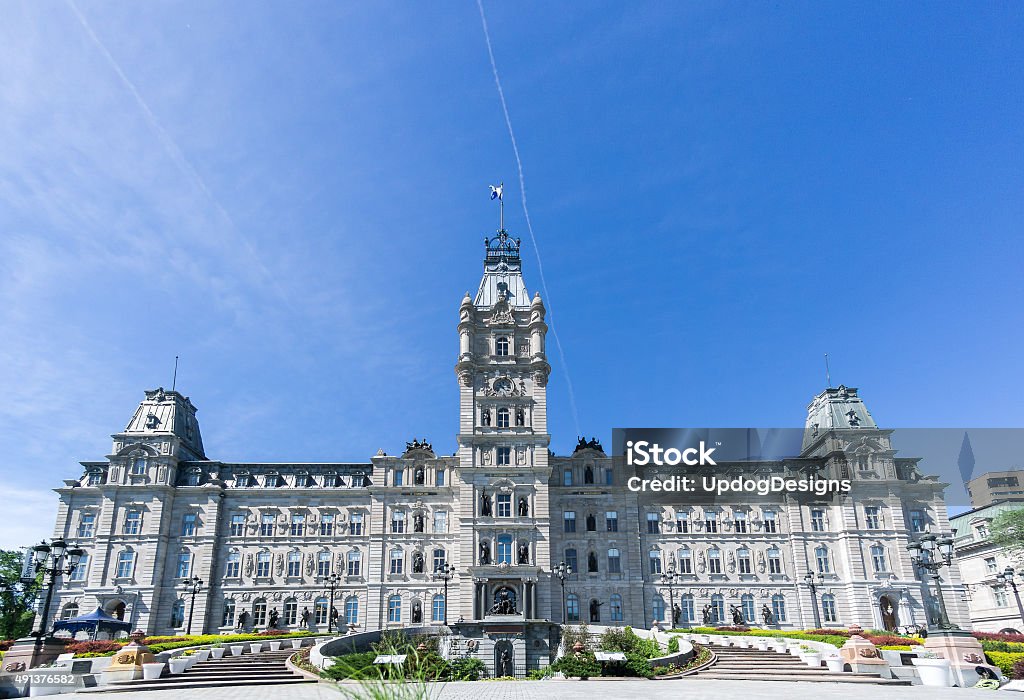 Quebec City Parliament Building in Summer Quebec City's Parliament building on a beautiful summers day with a blue sky background with contrails Quebec Stock Photo