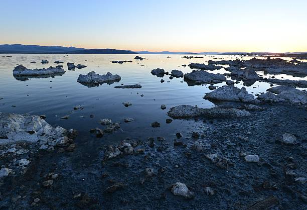 Mono lake at sunrise, the beauty of the sun showing the outline of the Jagged rocks on this volcanic landscape