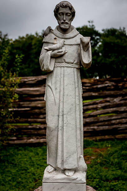 istock Statue of Monk with Bird 491377729