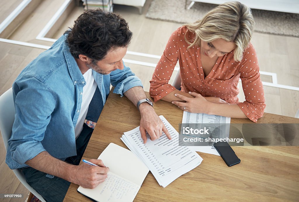 Making their money work for their marriage Shot of a couple working on their home financeshttp://195.154.178.81/DATA/i_collage/pu/shoots/805679.jpg Above Stock Photo