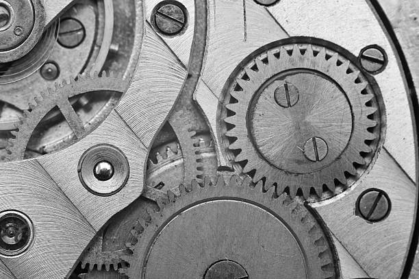 istock Black-and-white Metal Cogwheels in Clockwork. Macro 491378564
