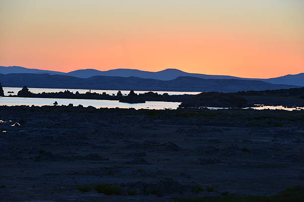Mono lake at sunrise, the beauty of the sun showing the outline of the Jagged rocks on this volcanic landscape