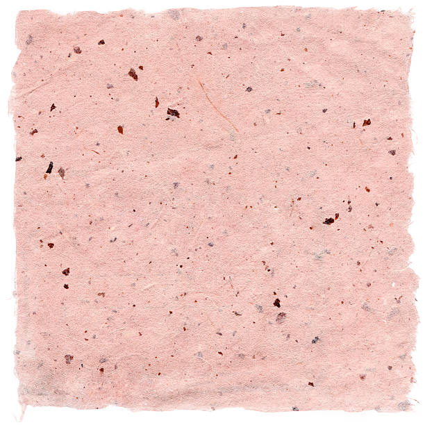 istock Rice handmade paper in pastel pink colour, isolated on white 491379046