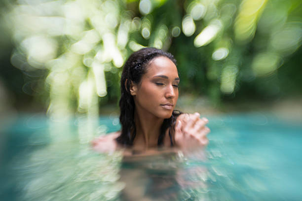 istock Young Woman In A Lagoon 491380117
