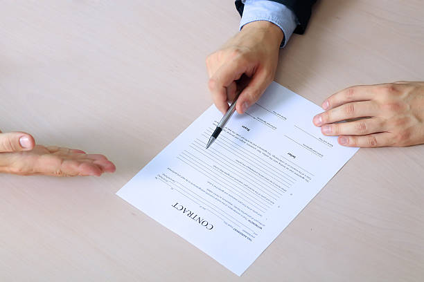 istock Two colleagues is signing a contract, business meeting 491380144