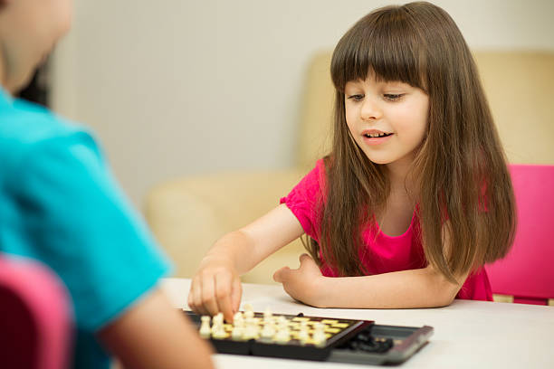 istock Chidlren playing shess indoors 491380525