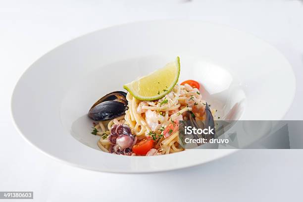 Pasta With Seafood Stock Photo - Download Image Now - Seafood, Linguini, White Background