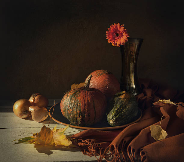 istock Still life with pumpkins and flower 491392362