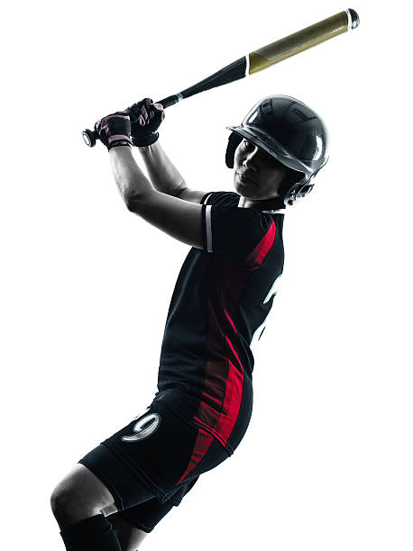 istock woman playing softball players silhouette isolated 491394734