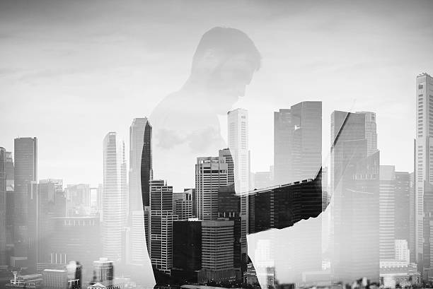 istock Double exposure of young man with laptop on the background 491407166