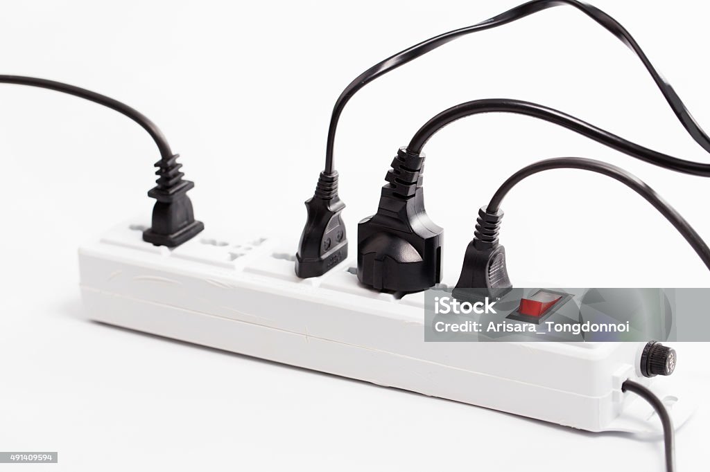 Multi plug electrical power strip isolated on a white background 2015 Stock Photo