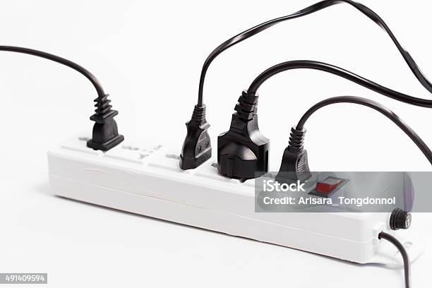 Multi Plug Electrical Power Strip Isolated On A White Background Stock Photo - Download Image Now