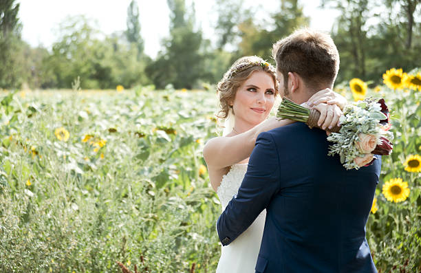 istock bride and groom in the nature on wedding day 491409874
