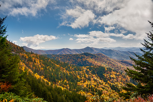 An autumn storm flows over the top of the mountains on Blue Ridge Parkway in North Carolina, USA. Lane Pinnacle has an elevation of 5230 feet.