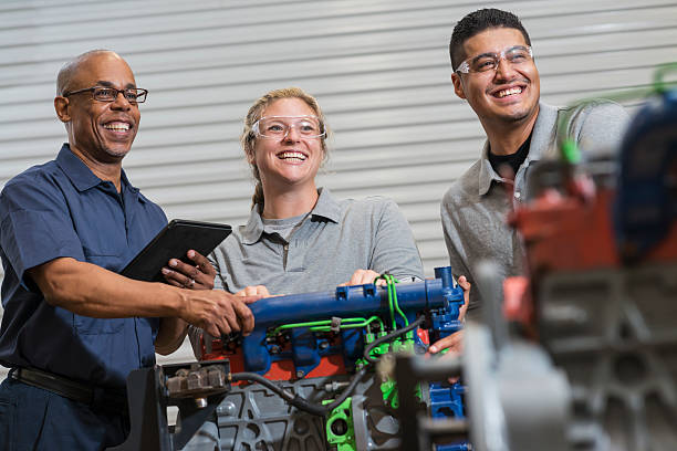 istock Vocational class, learning to repair diesel engine 491412056