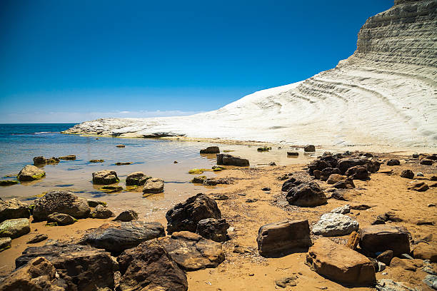 istock rocks in front of Scala dei Turchi 491425218