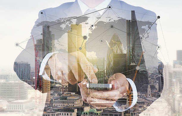 istock Double exposure of success businessman using smart phone 491426984