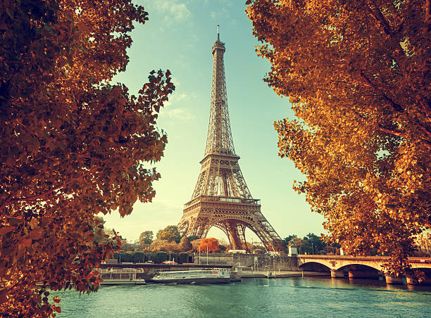 Seine in Paris with Eiffel tower in autumn time stock photo